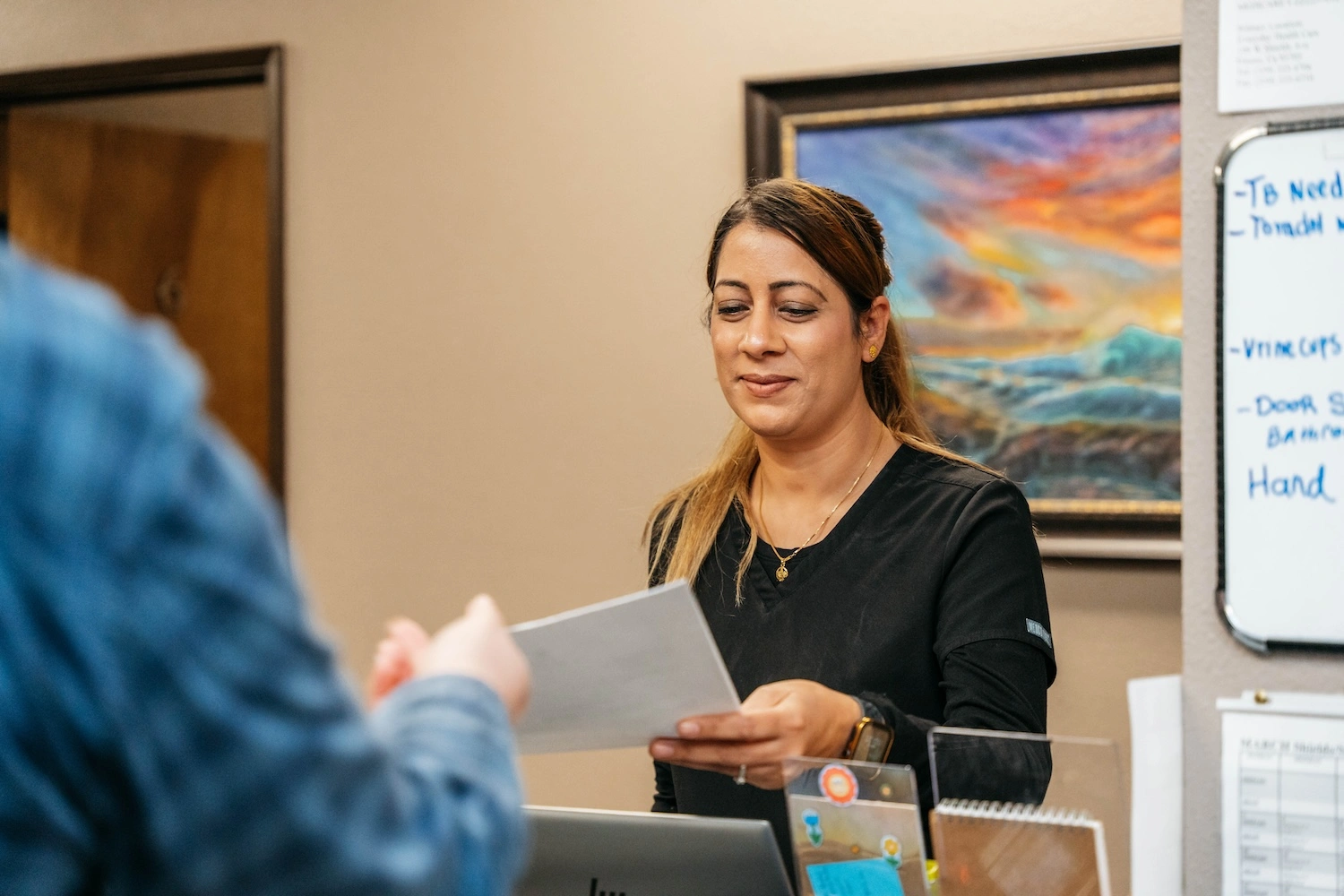 Patient being welcomed at EveryDay Healthcare for labs & x-rays